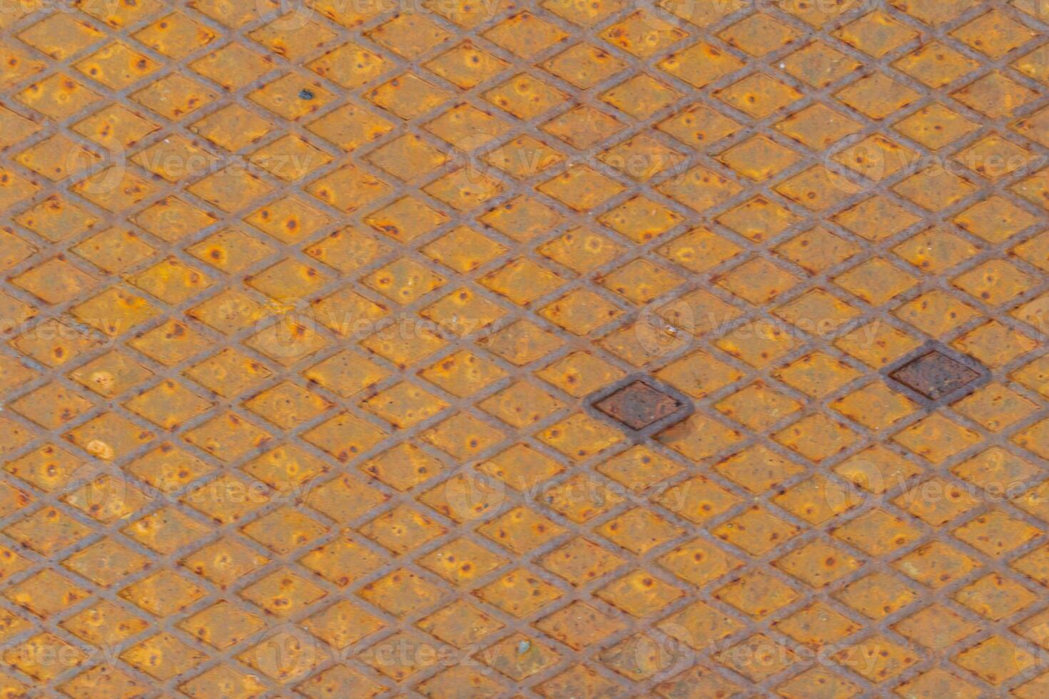 Rusty Metal Background Image is metal that has been corroded by moisture to the surface causing iron rust to form on the surface of the object. Rough patterns and surfaces are caused by corrosive rust photo