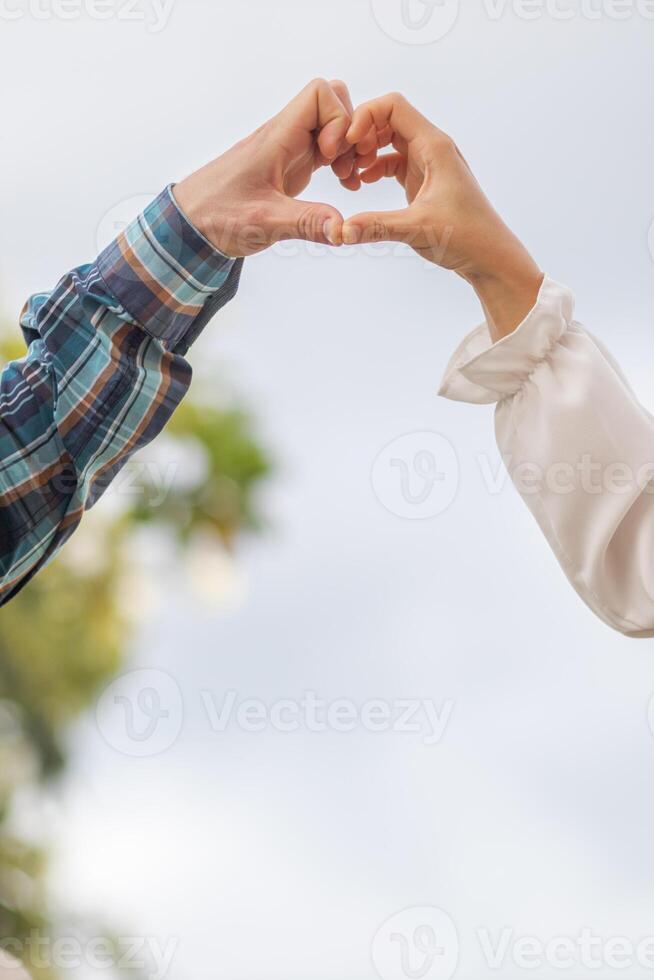 This soft focus hand drawn couple portrait symbolizes the heart of love, kindness and friendship with beautiful tranquility on a beautiful blurred background on a winter morning. Love concept photo