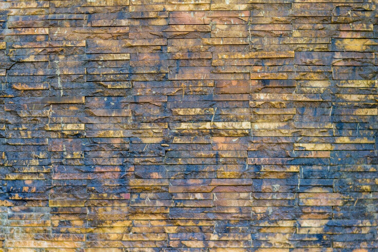 Brick wall background is a wall made of clay bricks, giving the structure strength and cement line between bricks that looks beautiful. It is popular to build a wall of ancient monuments.copy space, photo