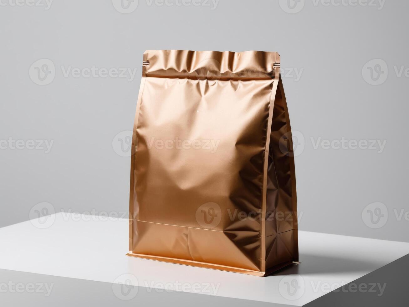 A bronze paper doypack is placed on a podium with an empty background. photo