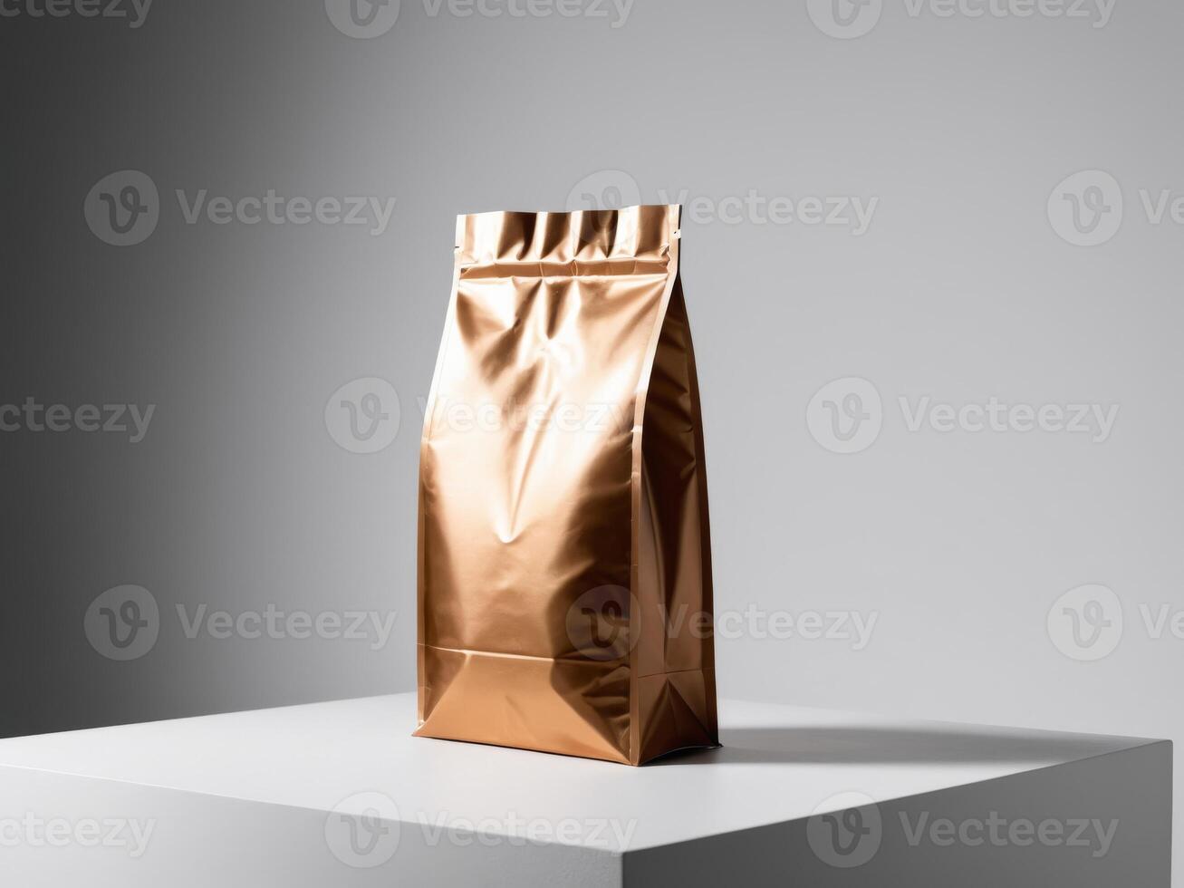A bronze paper doypack is placed on a podium with an empty background. photo