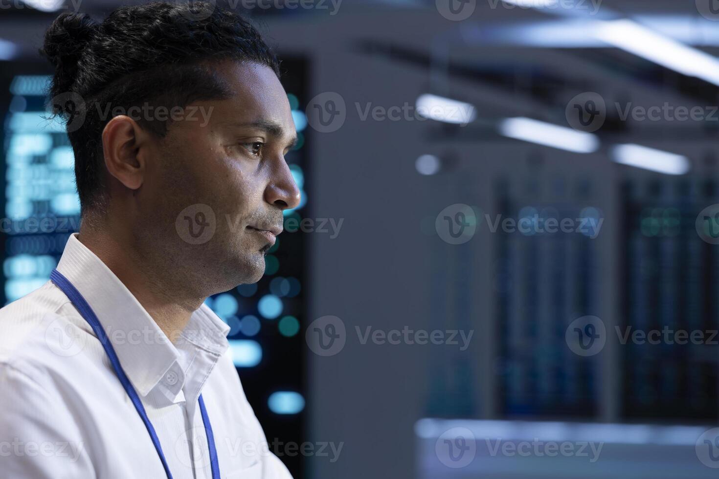 Admin does monitoring in server hub responsible with intense data computations demanding high capacity, scalable, error free network to effectively support artificial intelligence workloads, close up photo