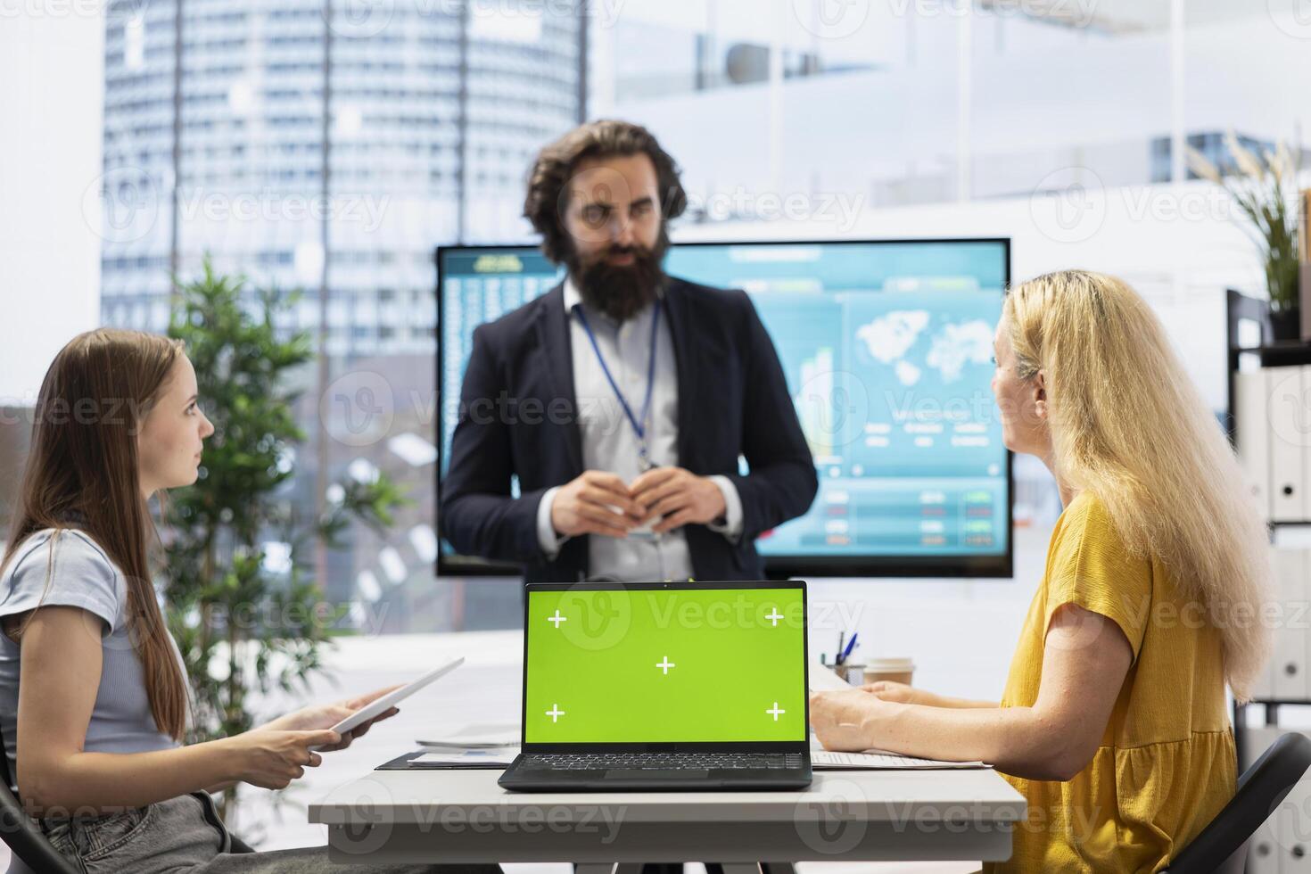 Financial advisor guiding clients in trading shares on forex market using isolated screen device. Broker offers investors tips on buying, selling and holding stocks on chroma key notebook photo