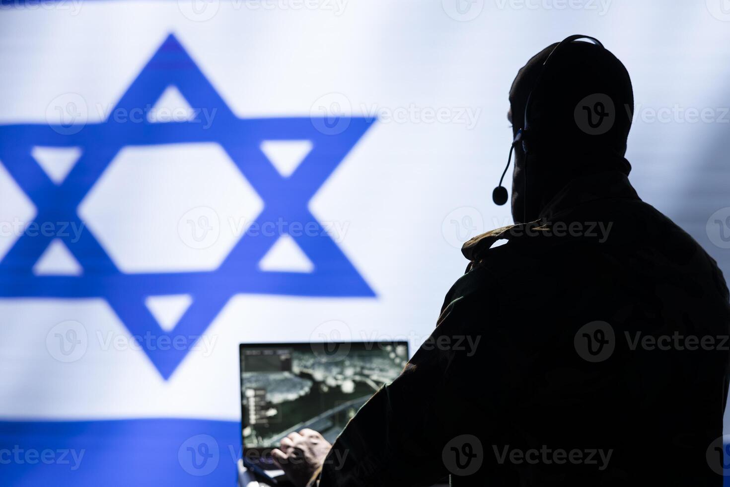 Communication systems operator working for Mossad using radio and satellite equipment, providing combat support. Israeli military dispatcher managing broadcasting networks, Israel flag photo