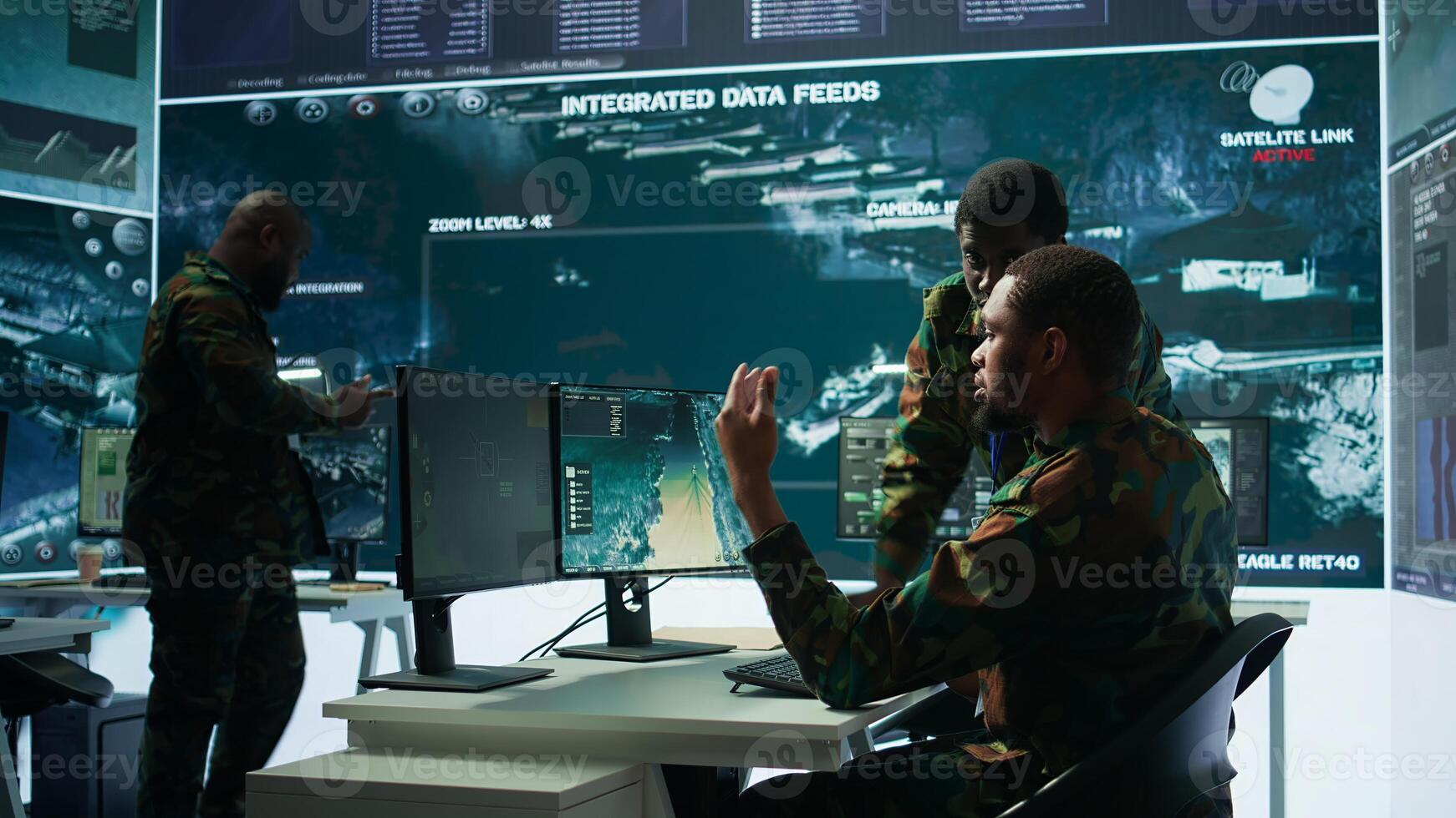 IT analyst managing satellite radar systems in modern control tower, overseeing intelligence activities and interpreting real time data. National interests for a defense mission. Camera B. photo