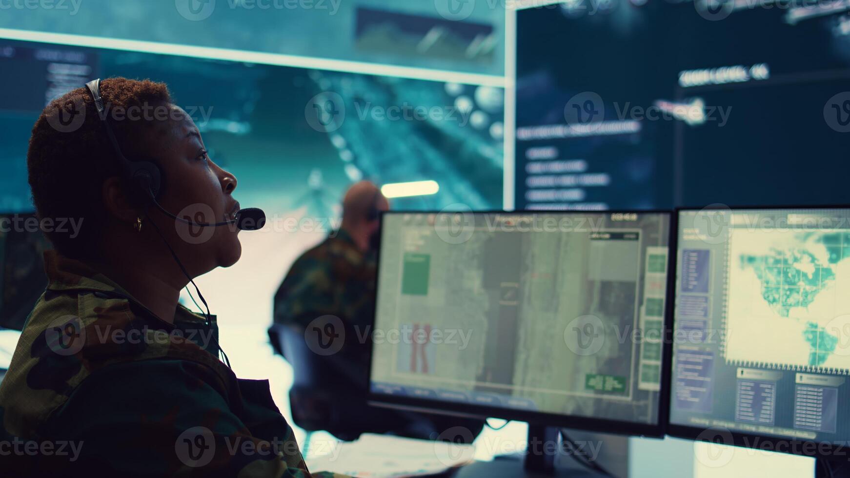 Woman military personnel tracking enemy vessels on the coast line territory, working on national safety and providing real time data to the dispatch center. Reconnaissance system. Camera B. photo