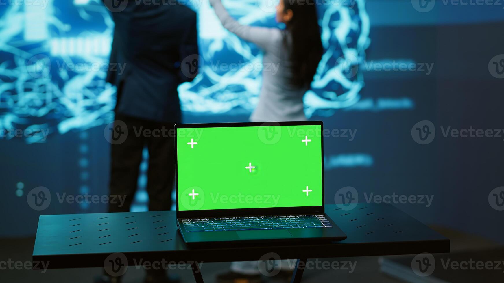 Startup coworkers using AI software on chroma key notebook to take data driven decisions. Close up of isolated screen laptop used for developing artificial intelligence solutions, camera A photo