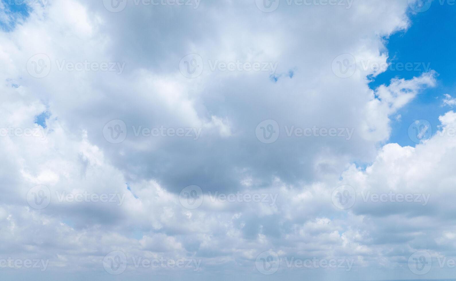 Beautiful view of blue sky with clouds at sunrise. Partly cloudy. Colorful sunset. Natural sky background texture, beautiful color. photo