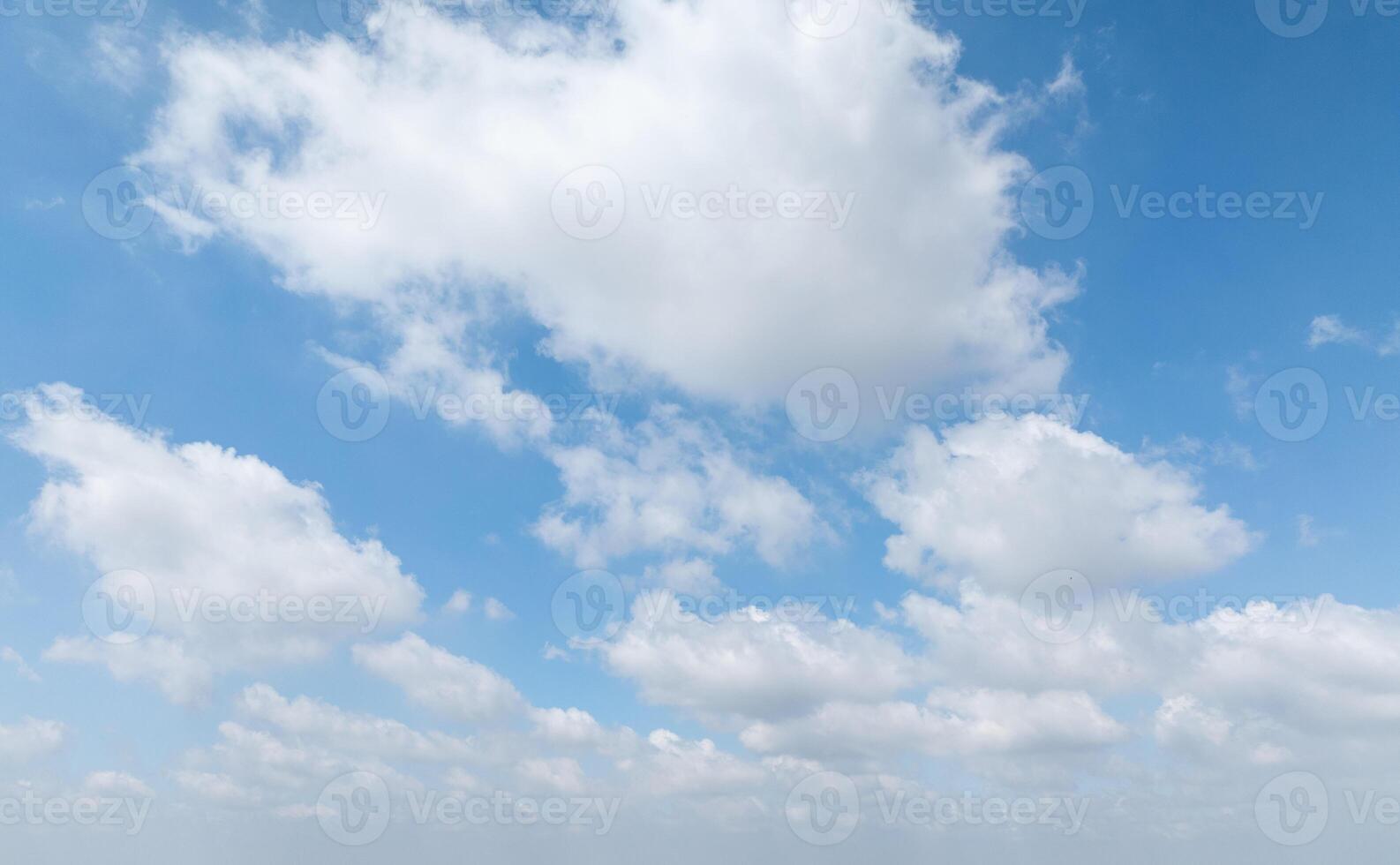 Beautiful view of blue sky with clouds at sunrise. Partly cloudy. Colorful sunset. Natural sky background texture, beautiful color. photo