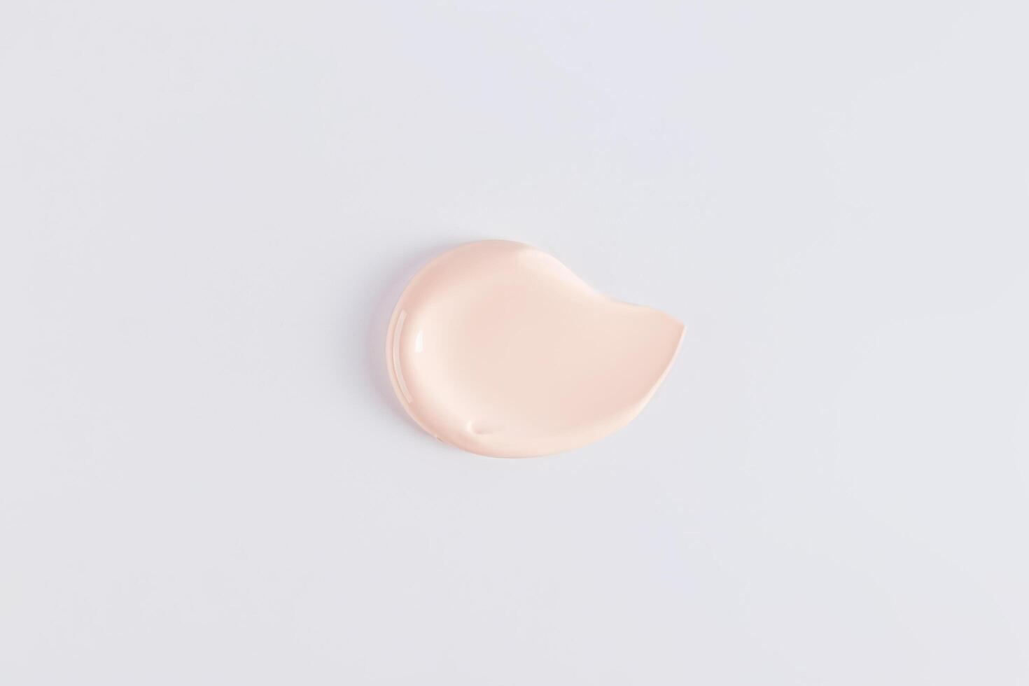 A sample, a stroke of foundation powder in a natural tone. cosmetic swatch. Mockup for the design of the cosmetic texture of the product photo