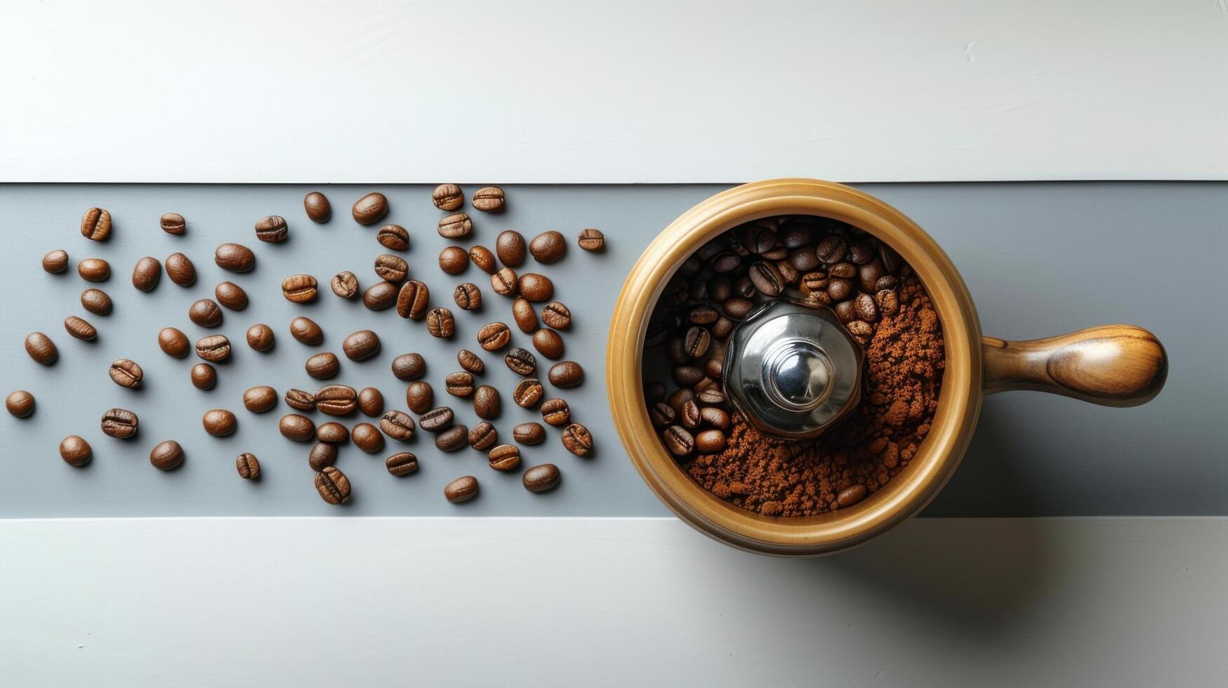 Top View of Coffee Grinder with Freshly Ground Coffee and Whole Coffee Beans on a Modern Kitchen Counter photo