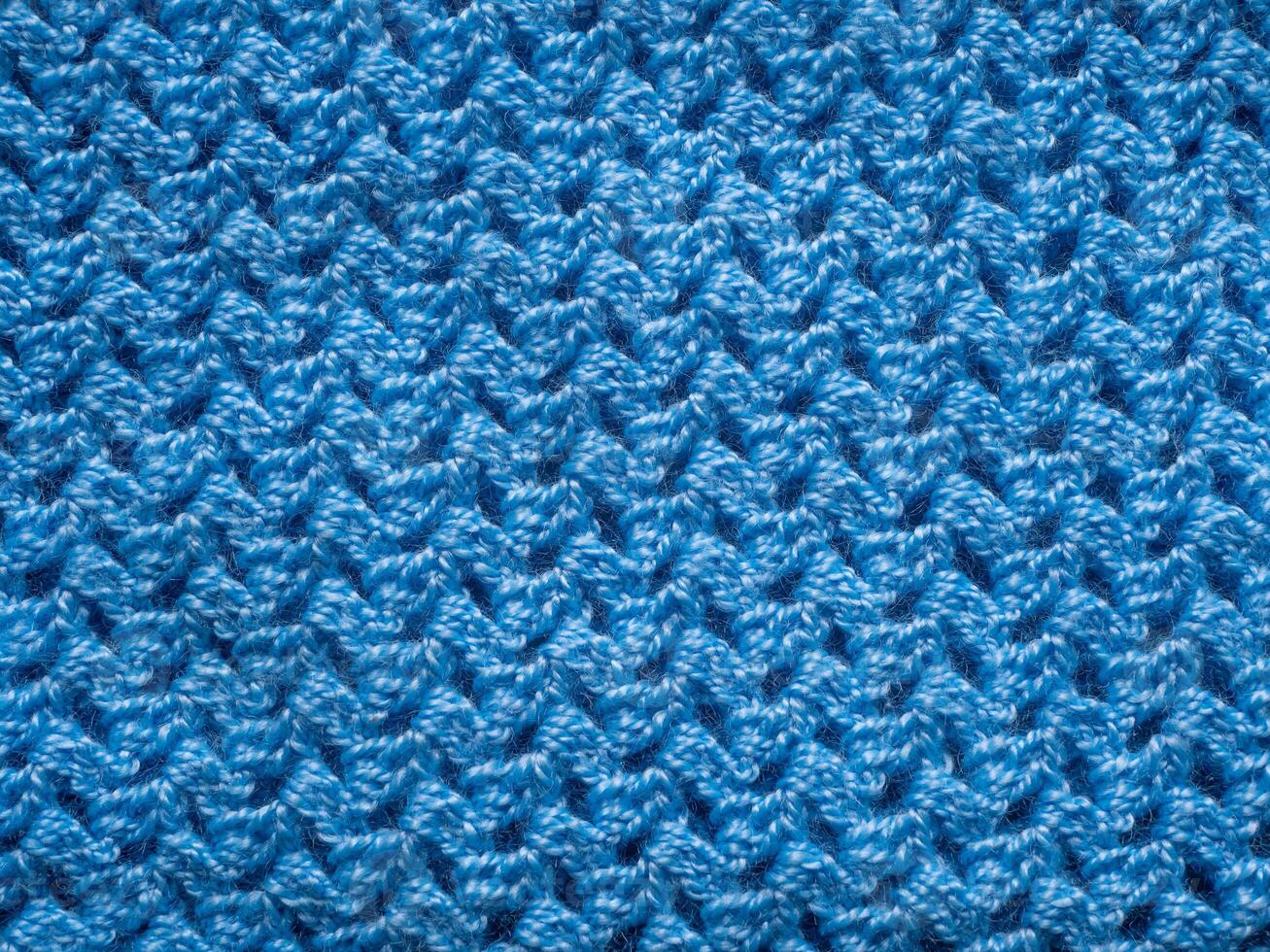 top view weave patterned surface blue knitted wool fabric closeup texture background photo