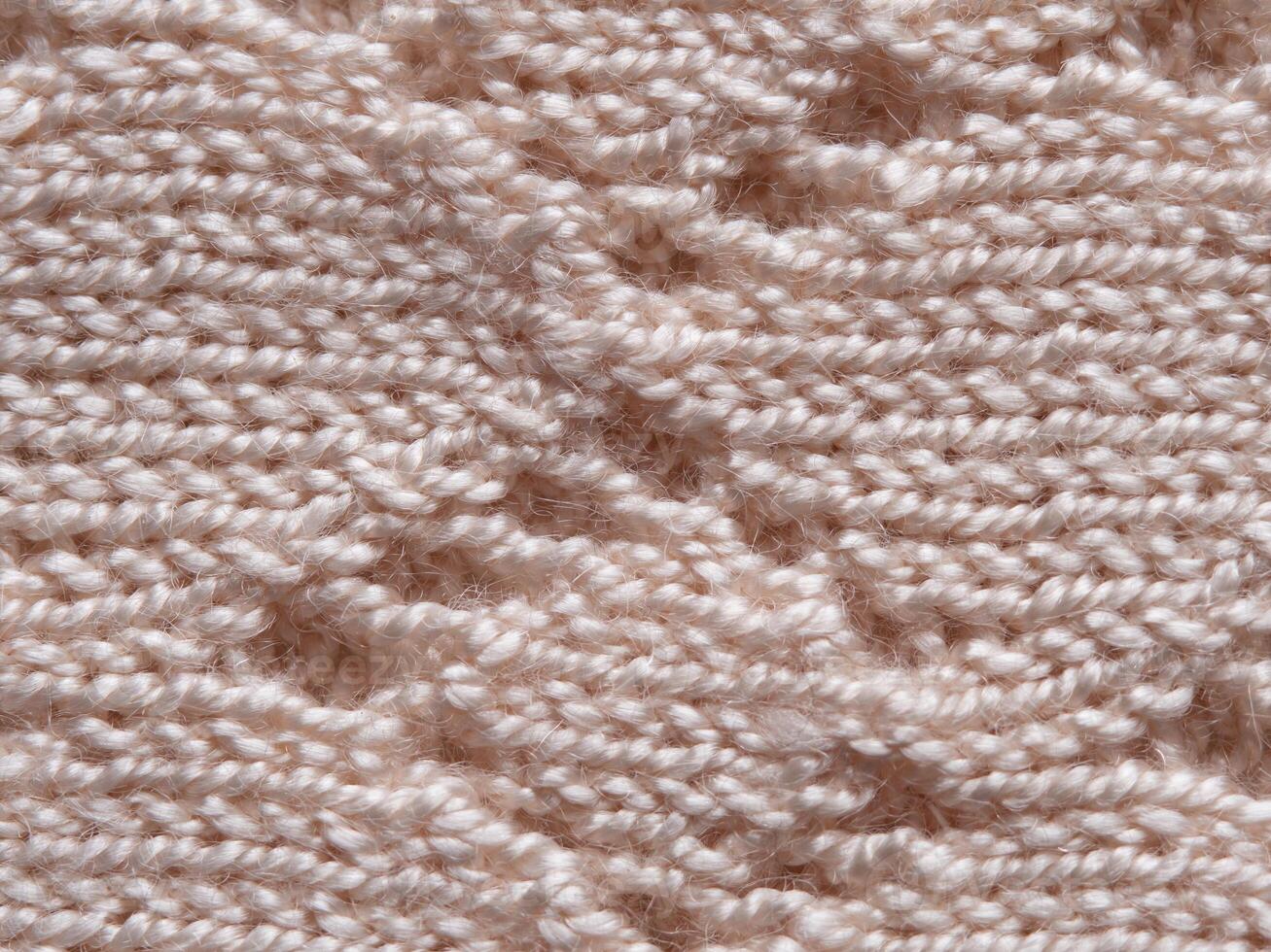 beige knitted wool fabric texture background patterned surface photo