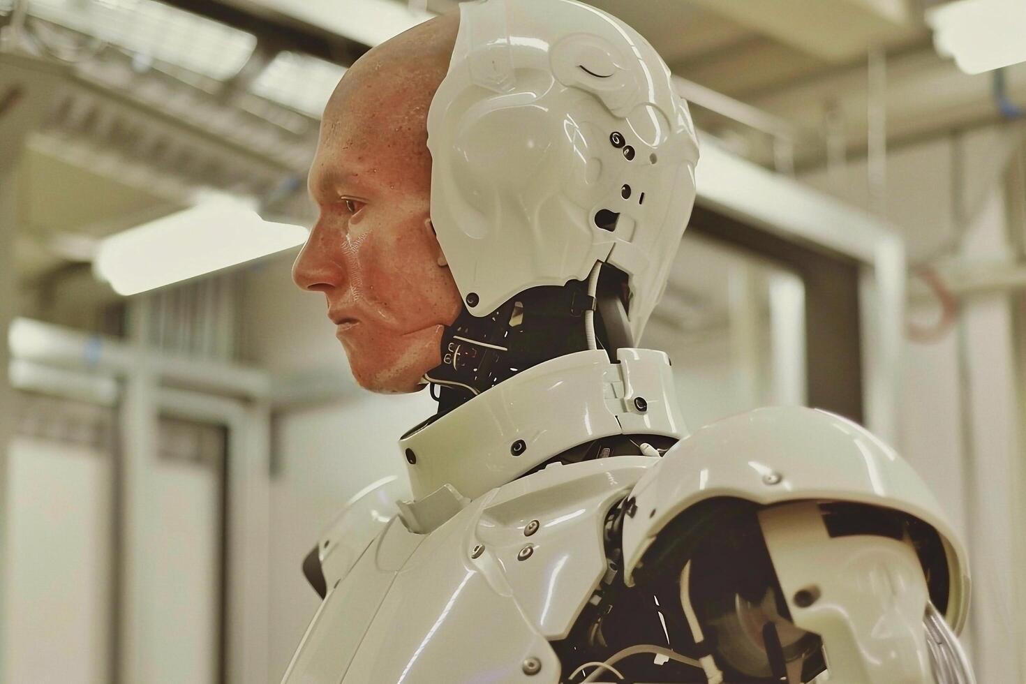 Side view of man in white robot costume. photo