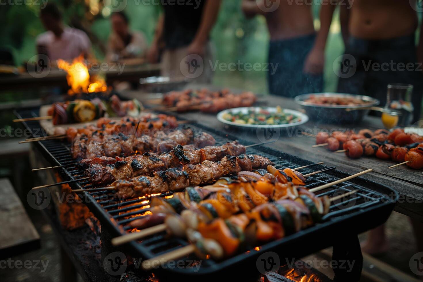Backyard Barbecue Party with Grilled Skewers and Friends Enjoying Outdoor Food photo