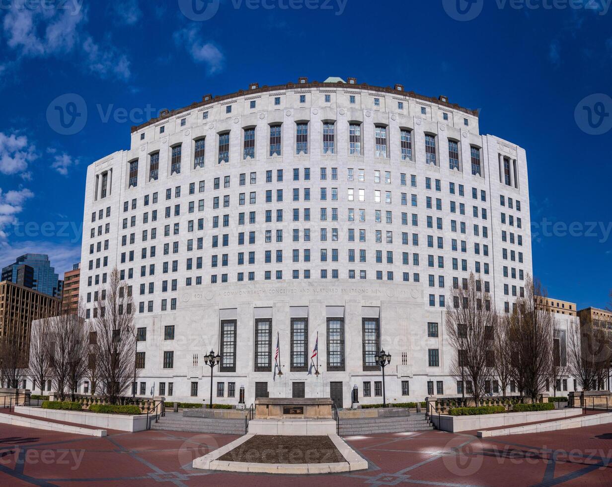 Wide angle panorama of the white marble entrance and facade to the Supreme Court of Ohio in Columbus with US flag flying photo