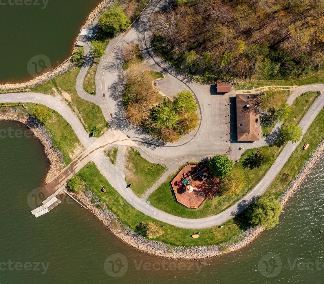 Aerial view looking straight down on the childrens play park at Cheat Lake Park near Morgantown West Virginia on a beautiful calm spring morning photo