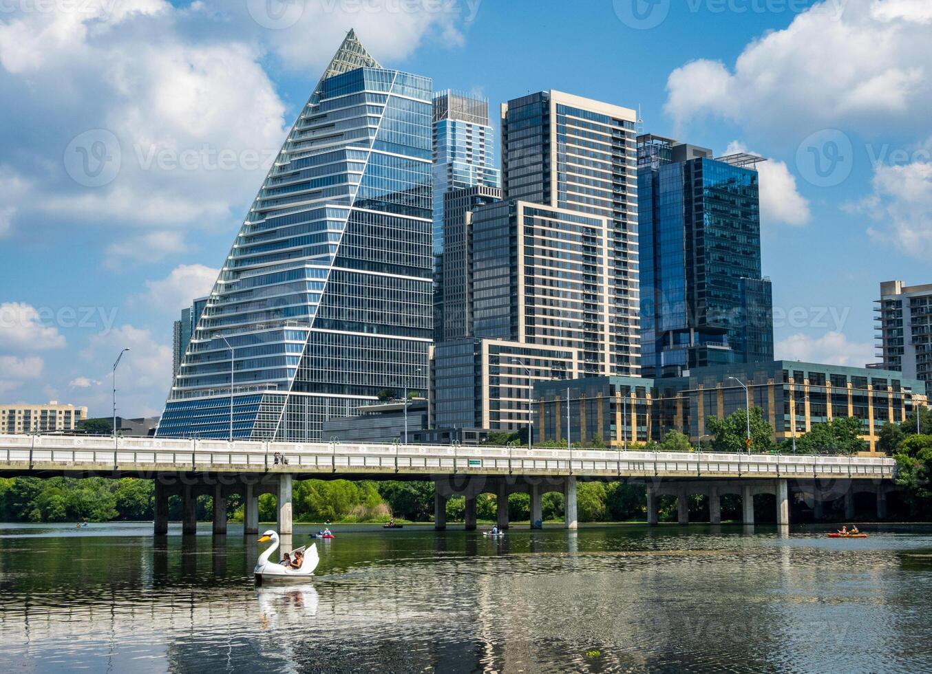 Modern apartment buildings and offices by the Colorado River in cityscape skyline of Austin Texas photo