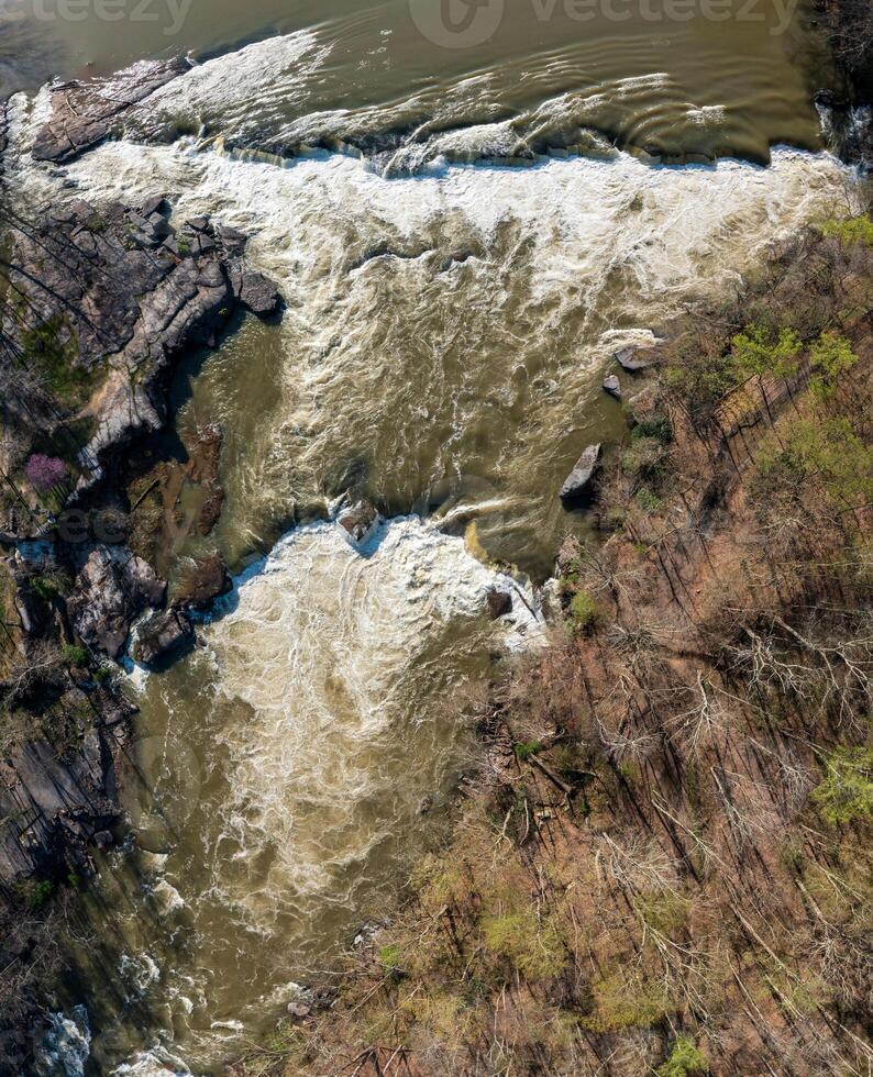 Aerial vertical view of Valley Falls State Park near Fairmont in West Virginia on a spring day with redbud blossoms photo