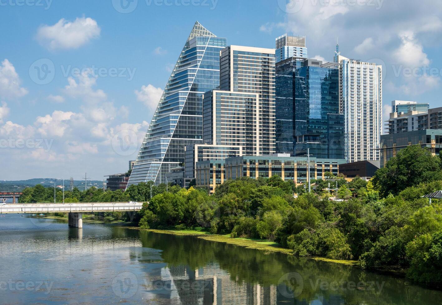 Modern apartment buildings and offices by the Colorado River in cityscape skyline of Austin Texas photo