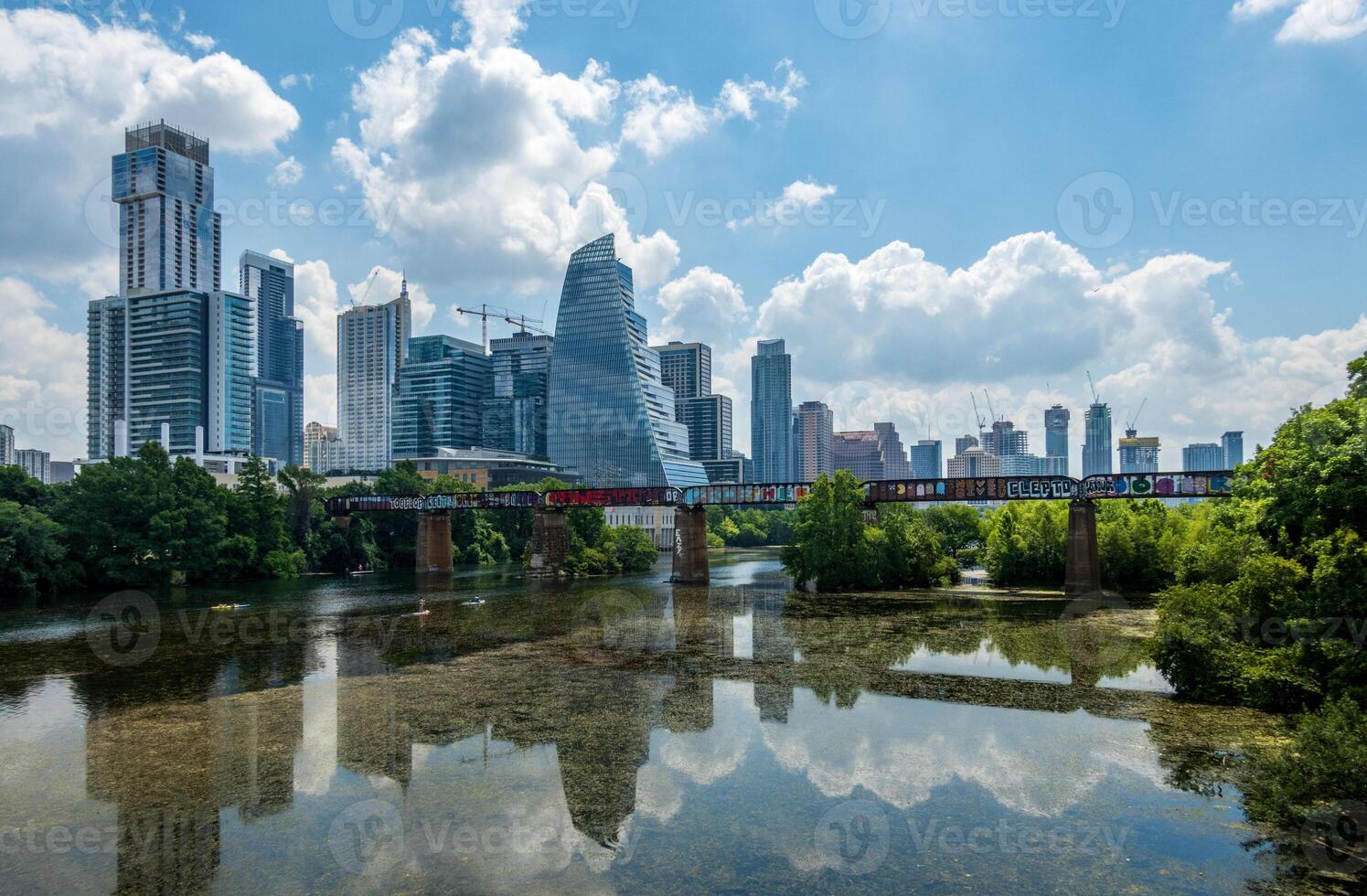 Austin, TX - 15 June 2023. Modern apartment buildings and offices by the Colorado River in cityscape skyline of Austin Texas photo