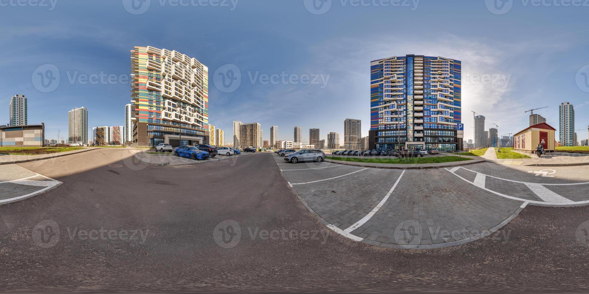 360 hdri panorama near skyscraper multistory buildings of residential quarter complex in full equirectangular seamless spherical projection photo