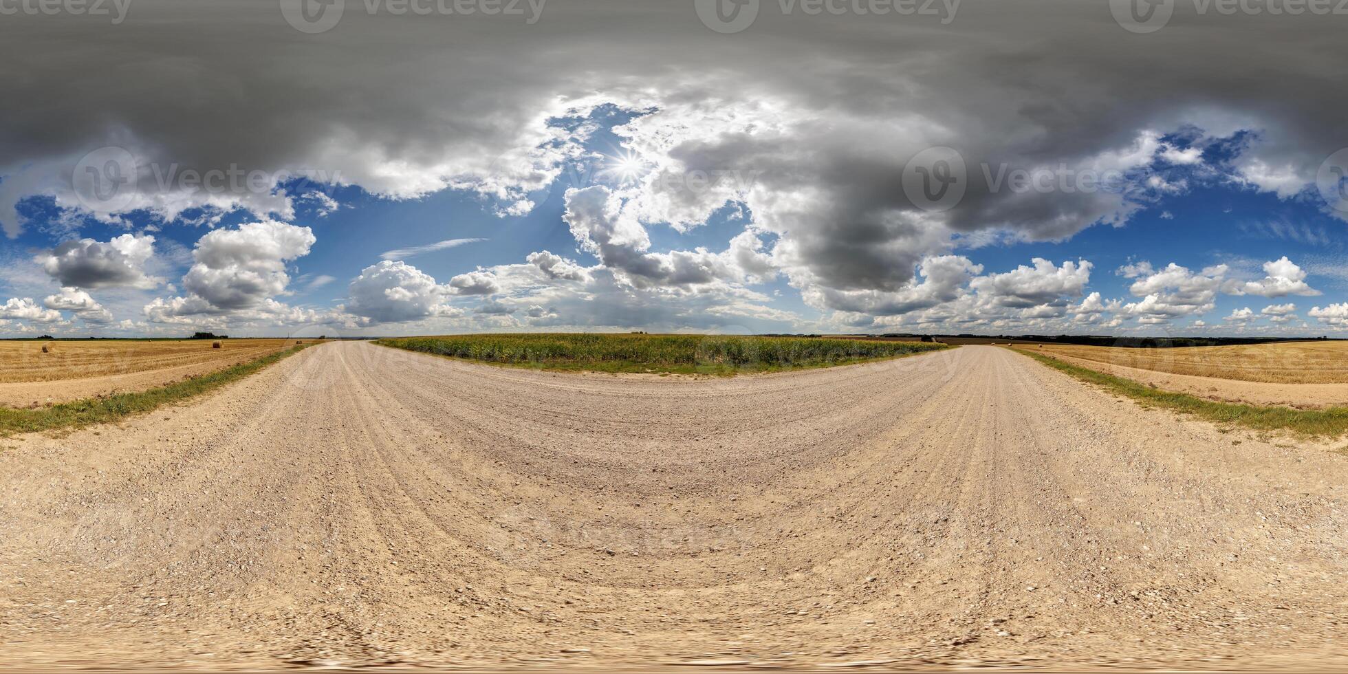 spherical 360 hdri panorama on side of gravel road with rain storm clouds in dark sky in equirectangular seamless projection, as skydome replacement in drone panoramas, game development photo
