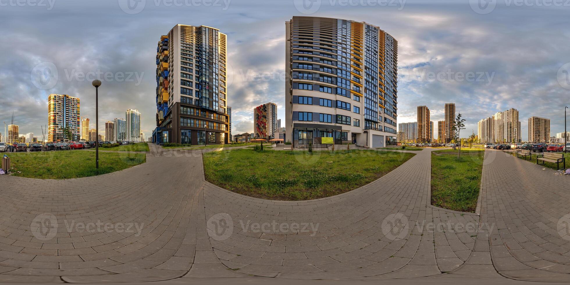 hdri 360 panorama near new skyscrapers and residential complex at evening in full equirectangular seamless spherical projection photo