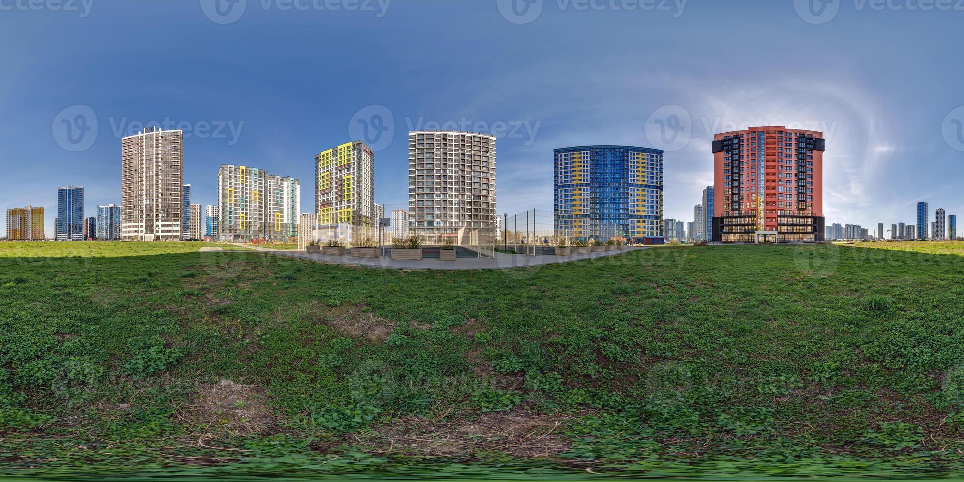 hdri panorama 360 near skyscraper multistory buildings of residential quarter complex in full equirectangular seamless spherical projection photo