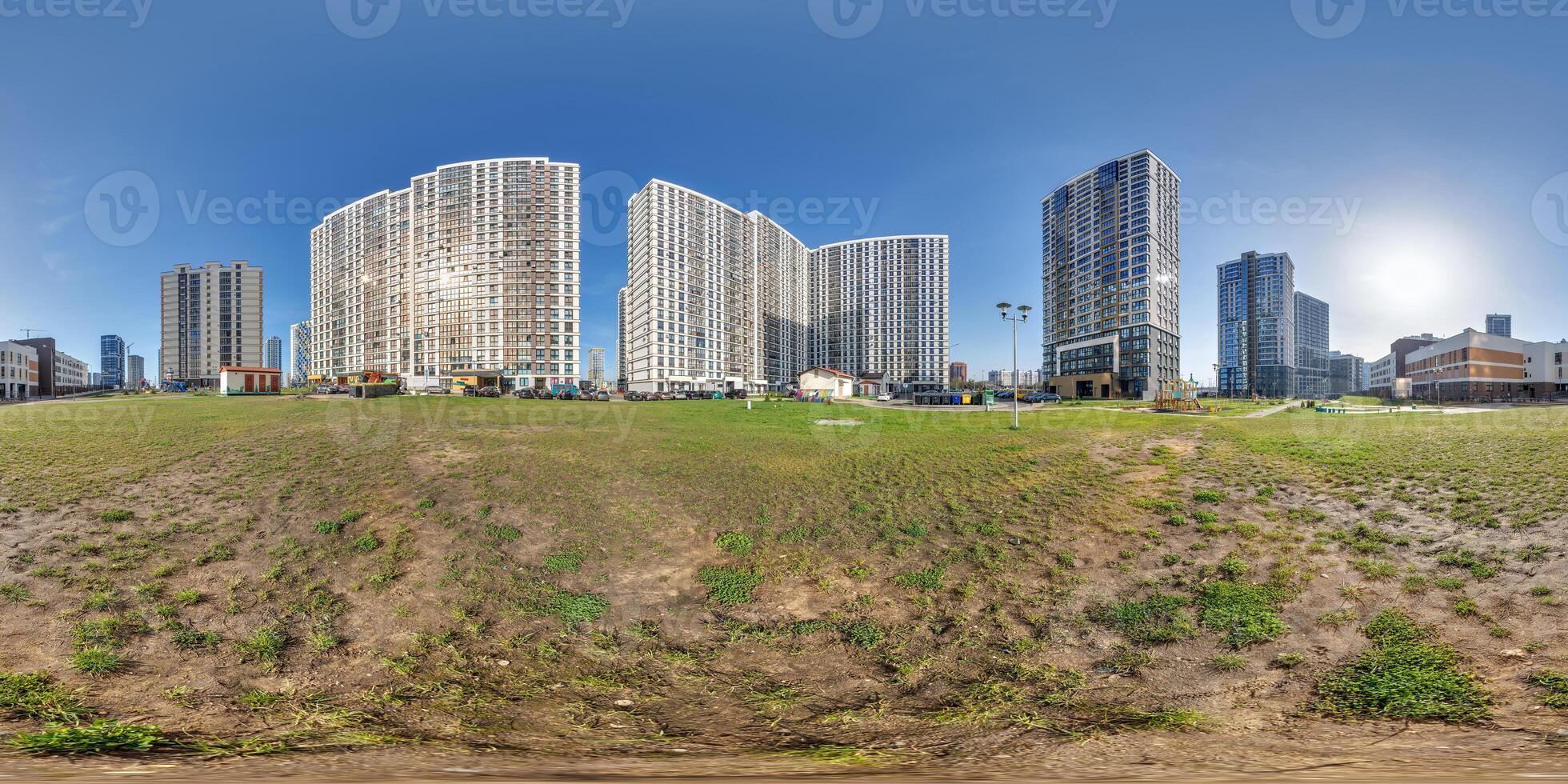 hdri panorama 360 near skyscraper multistory buildings of residential quarter complex in full equirectangular seamless spherical projection photo
