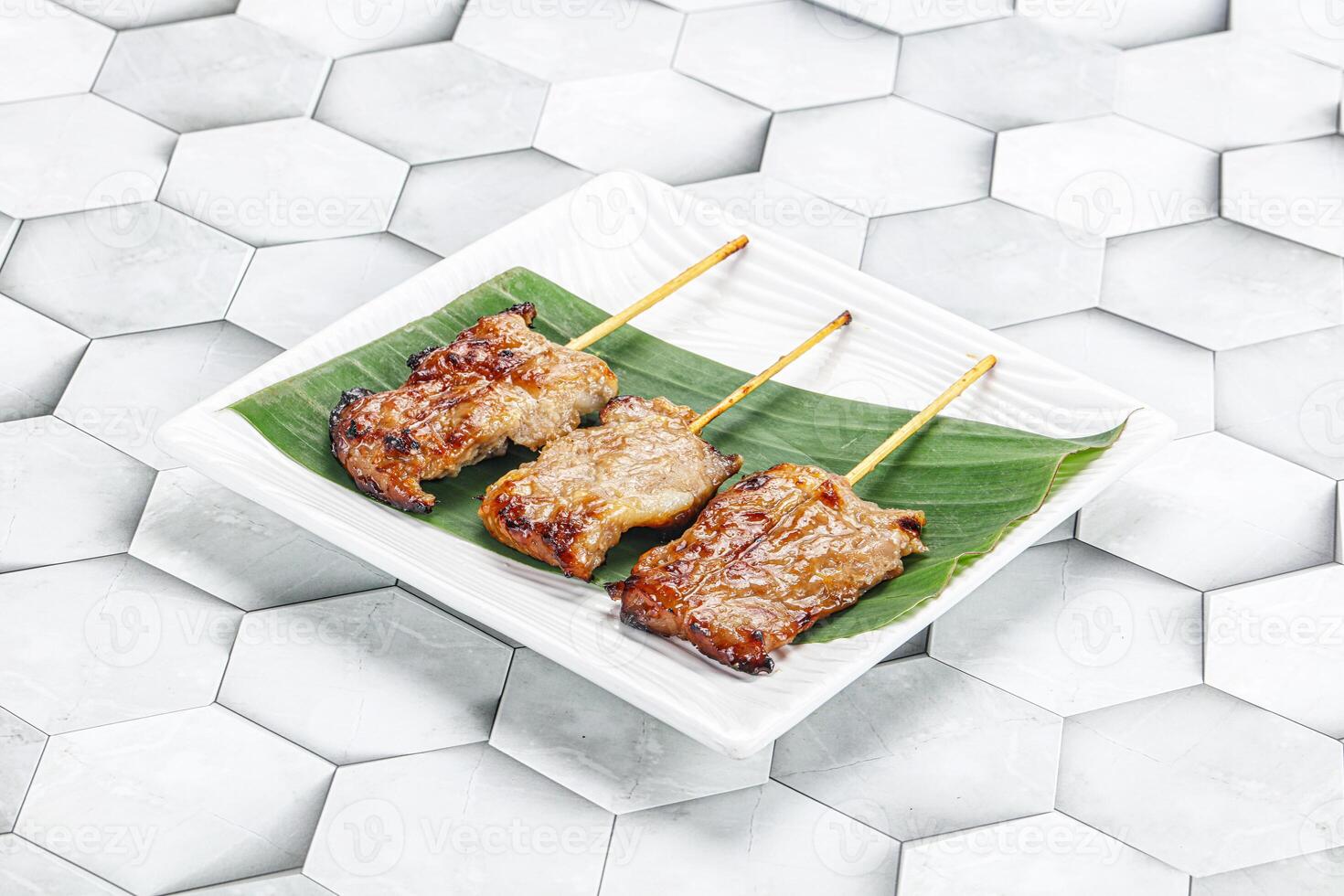Thai cuisine - grilled pork skewer photo
