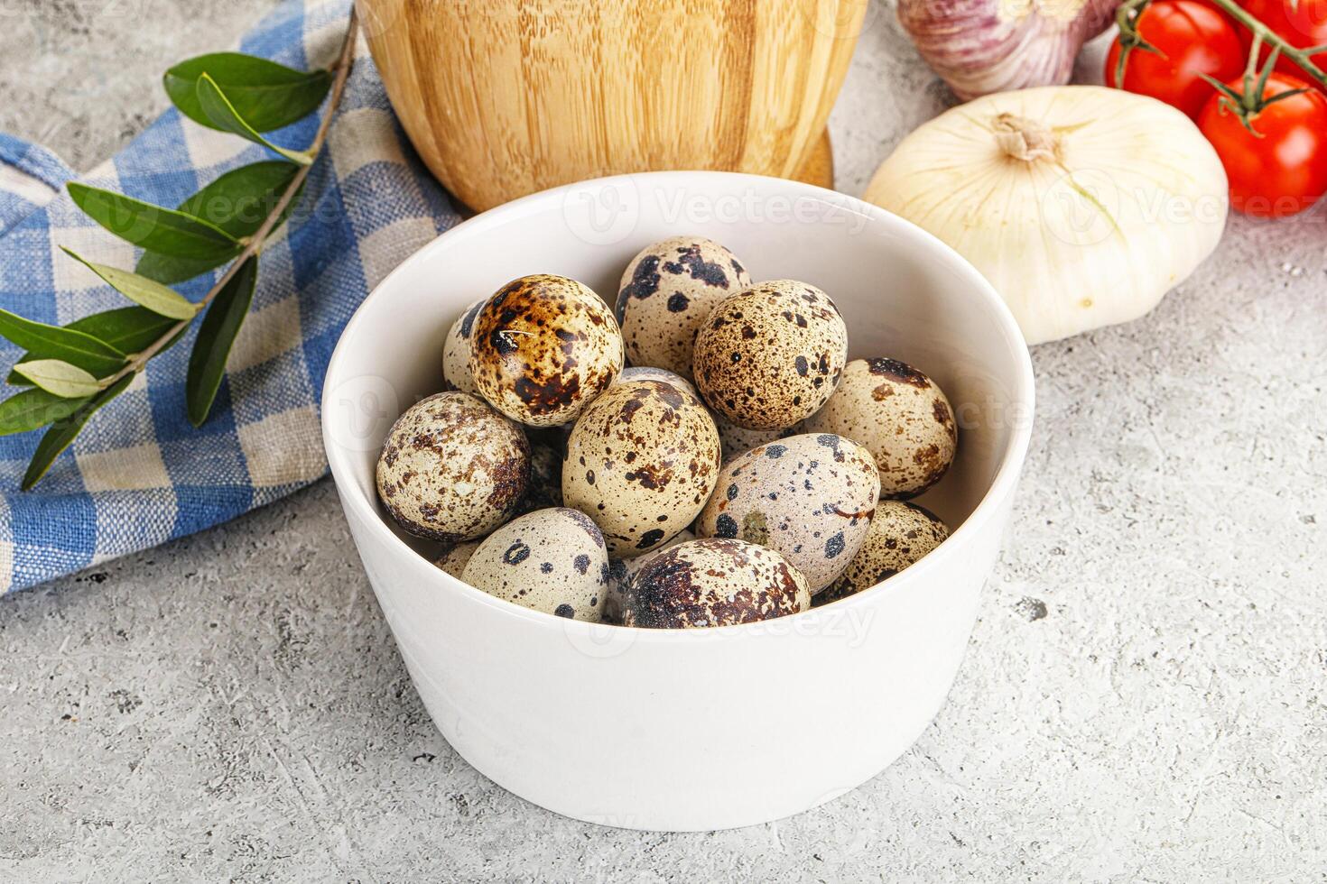 Raw quail eggs in the bowl photo