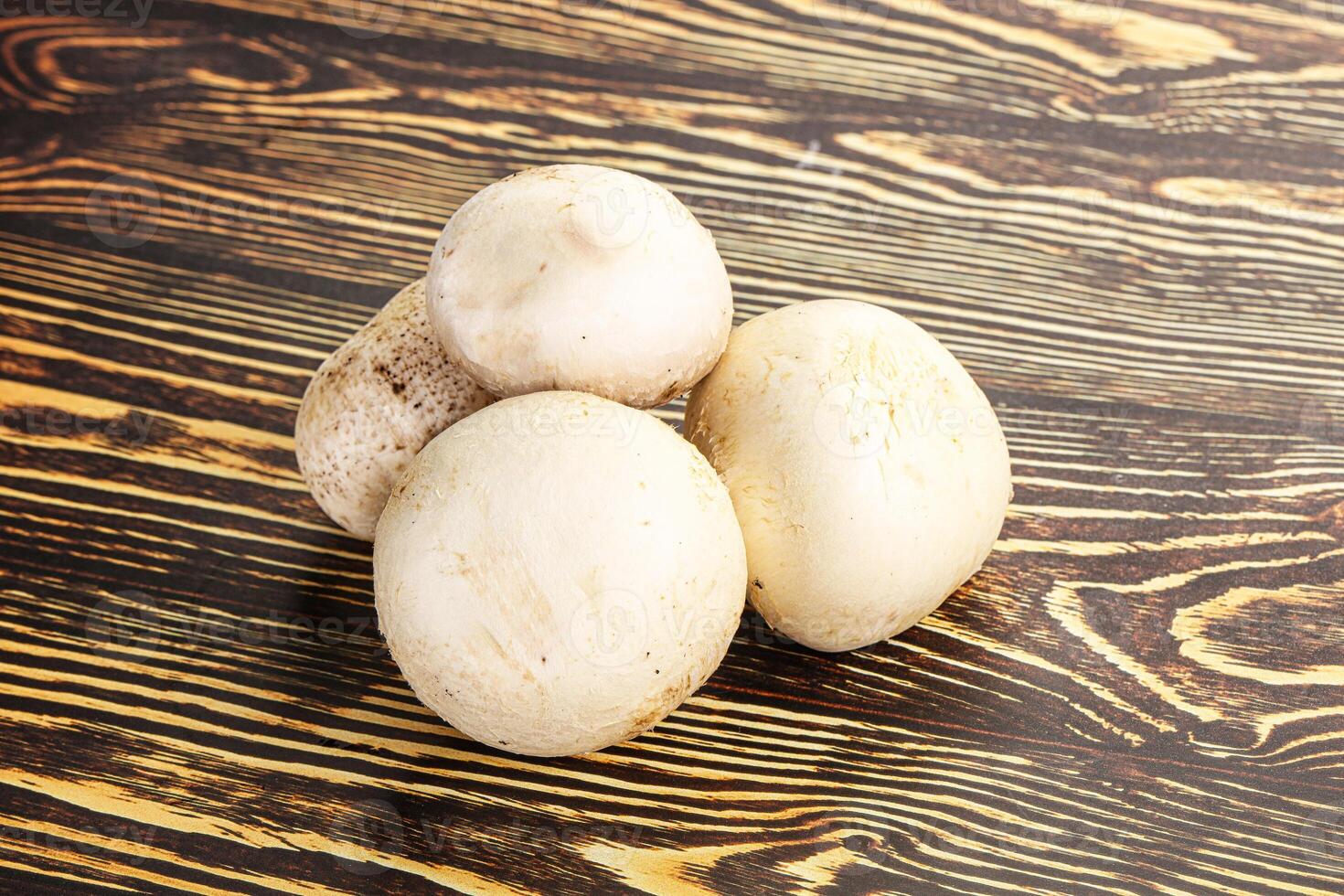 Natural organic ripe champignon mushrooms photo