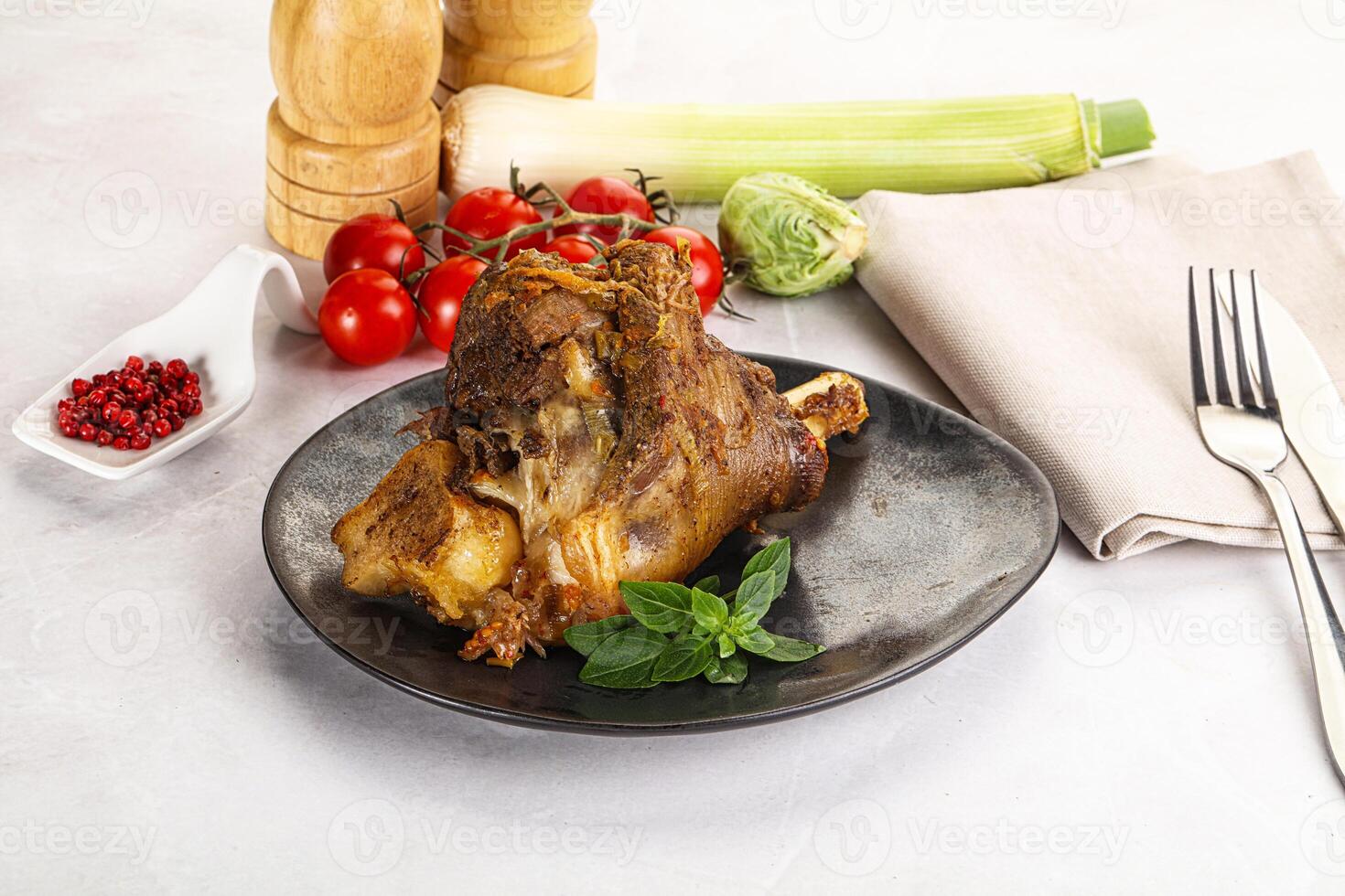 Baked Lamb shank with bone photo