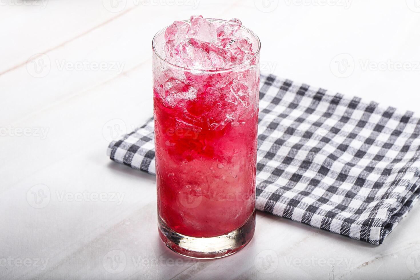 Cold strawberry cocktail with ice photo