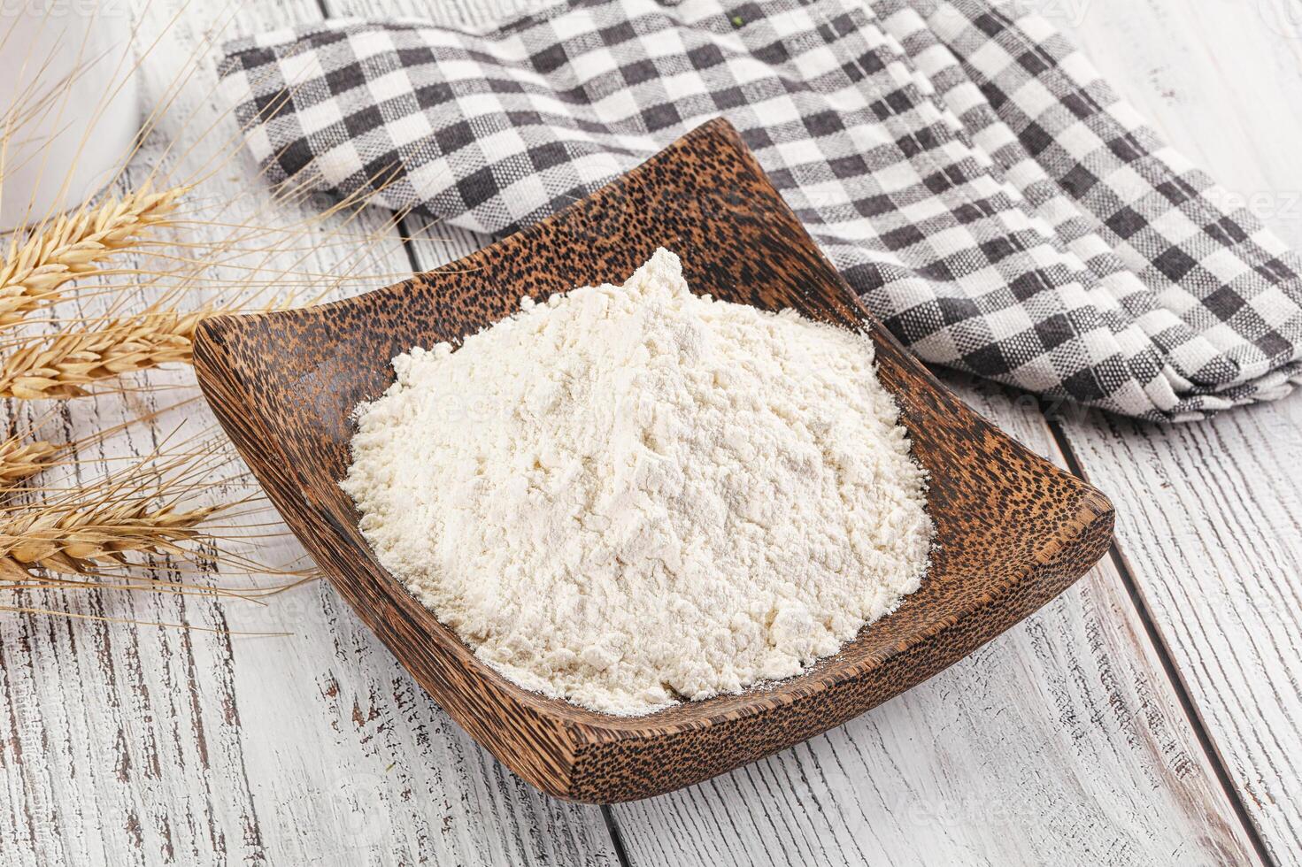 Wheat flour heap for bake photo