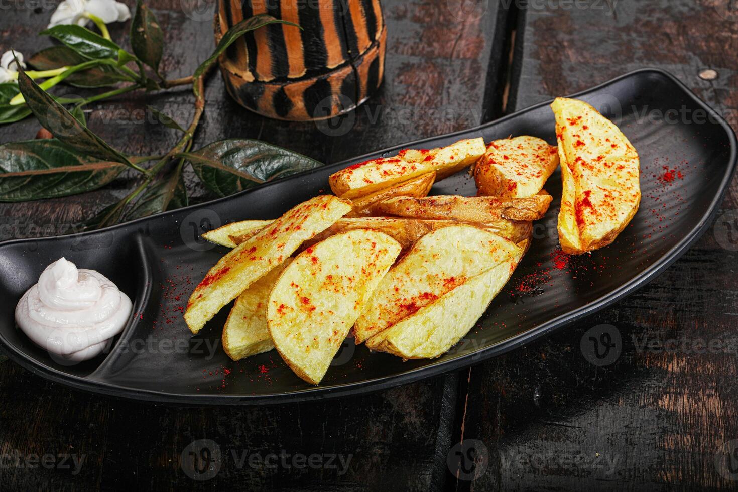 Baked Idaho potato with paprika photo