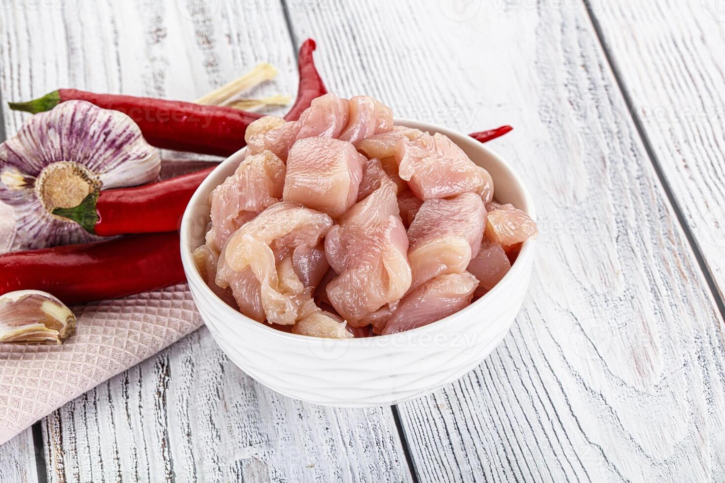 Raw uncooked chicken breast fillet photo