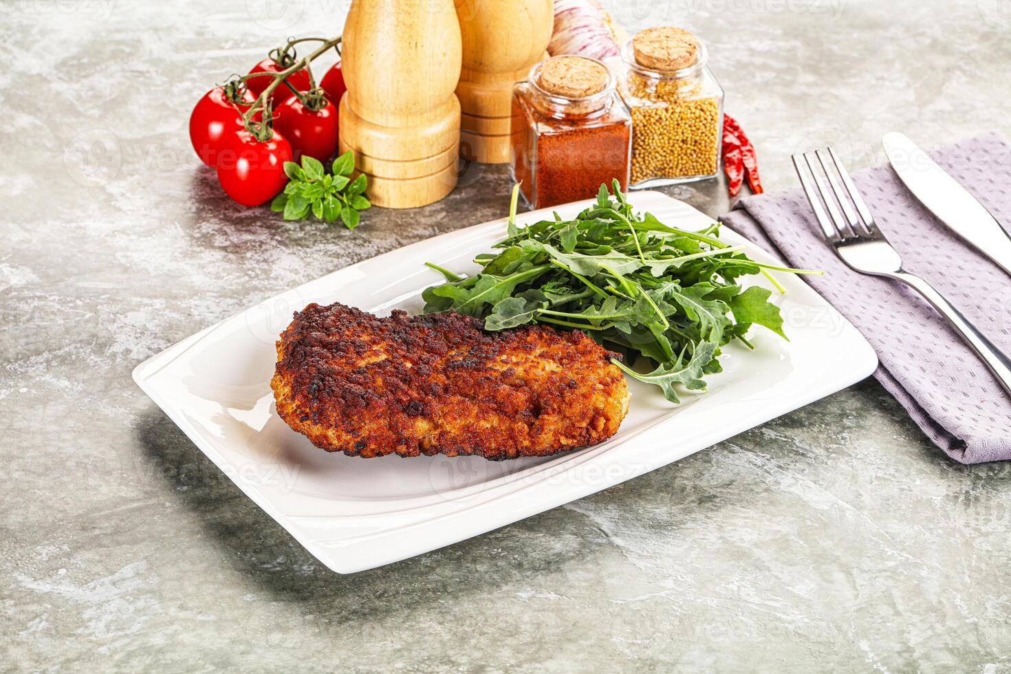 Tasty roasted breaded meat schnitzel photo