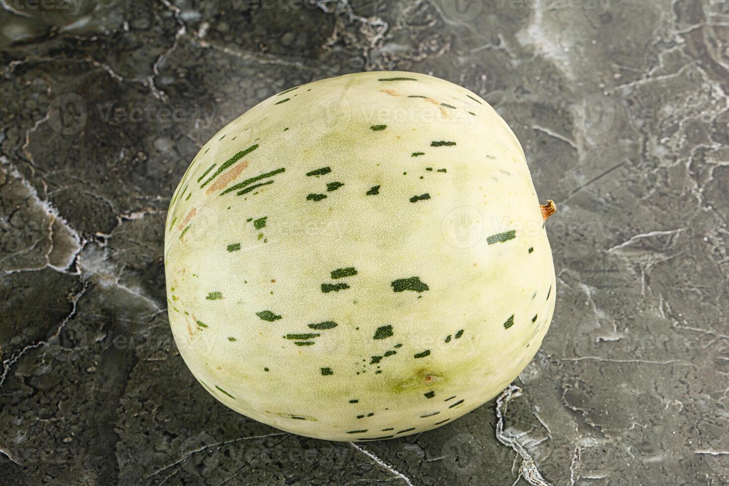 Ripe sweet juicy Dalmatin melon photo