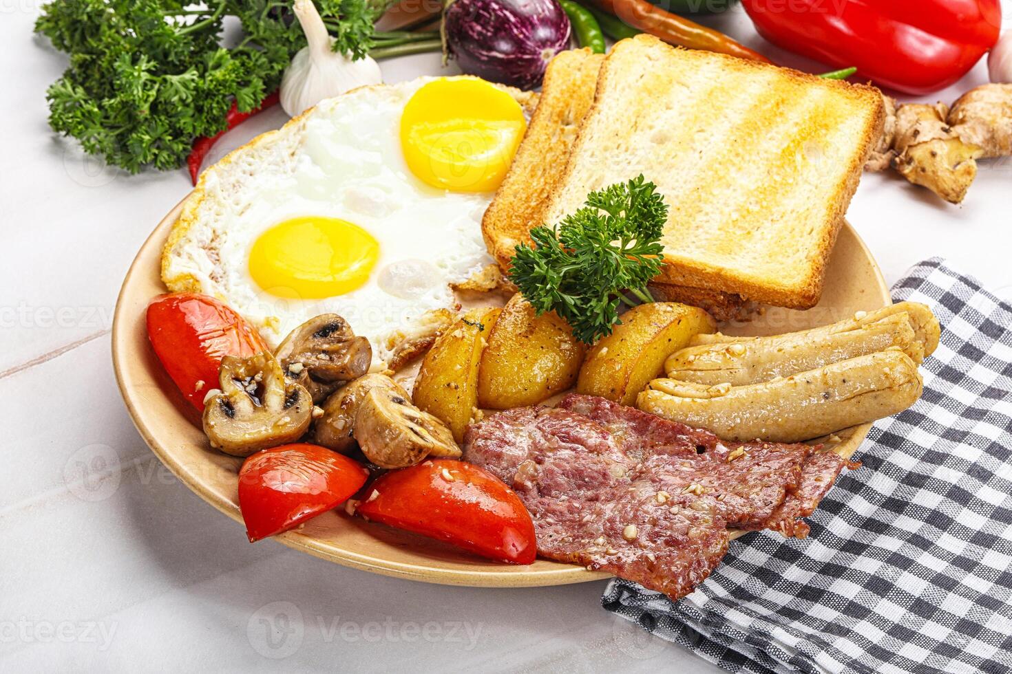 English breakfast with toast, egg and sausages photo