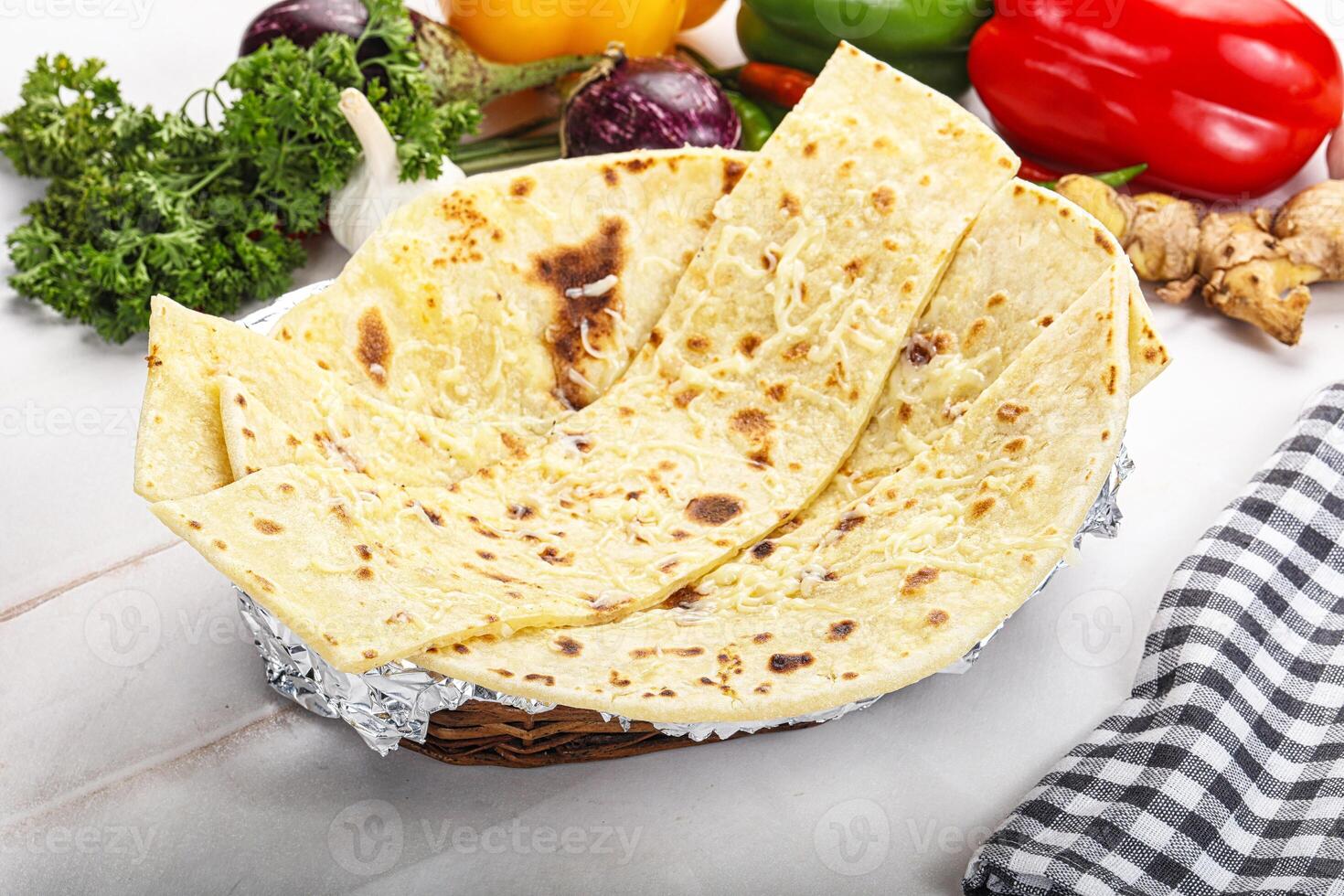 Indian bread cheese garlic naan photo
