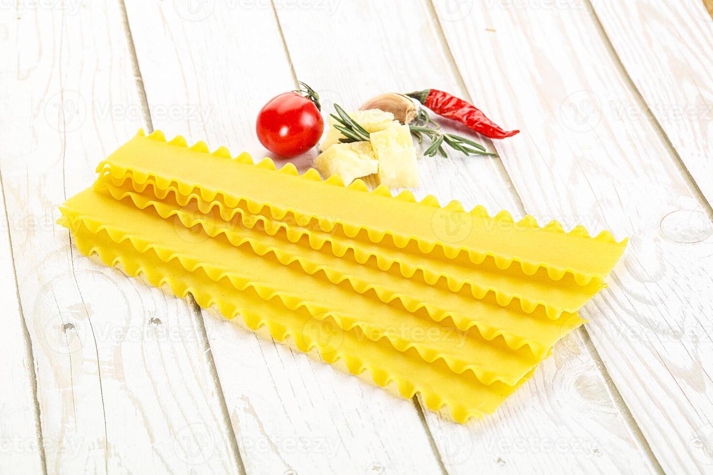 Uncooked raw Lasagna dry sheets photo