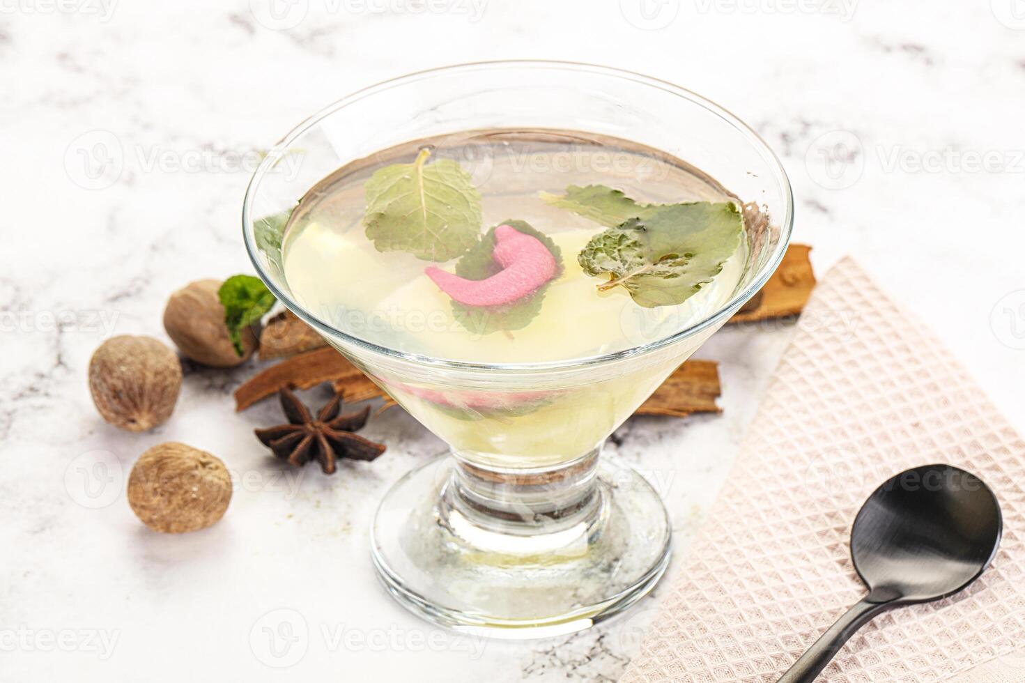 Sweet pineapple jelly with mint photo
