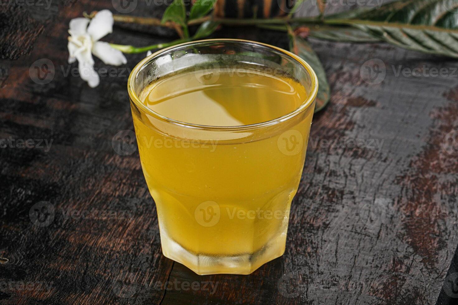 Homemade Kombucha drink in the glass photo