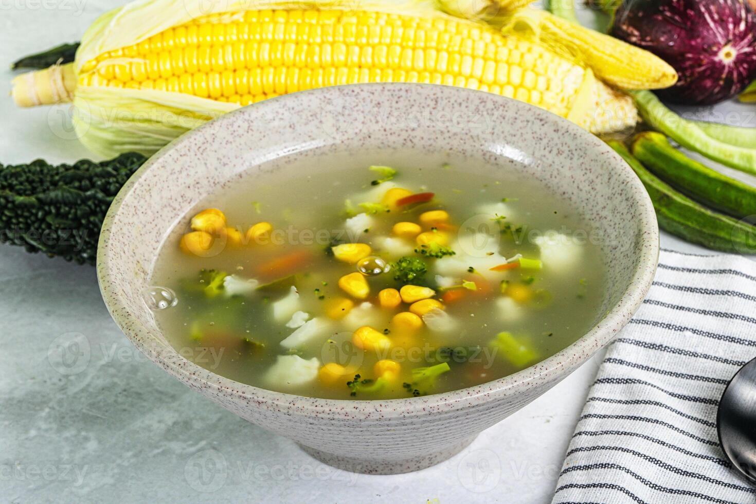 Soup with corn and broccoli photo