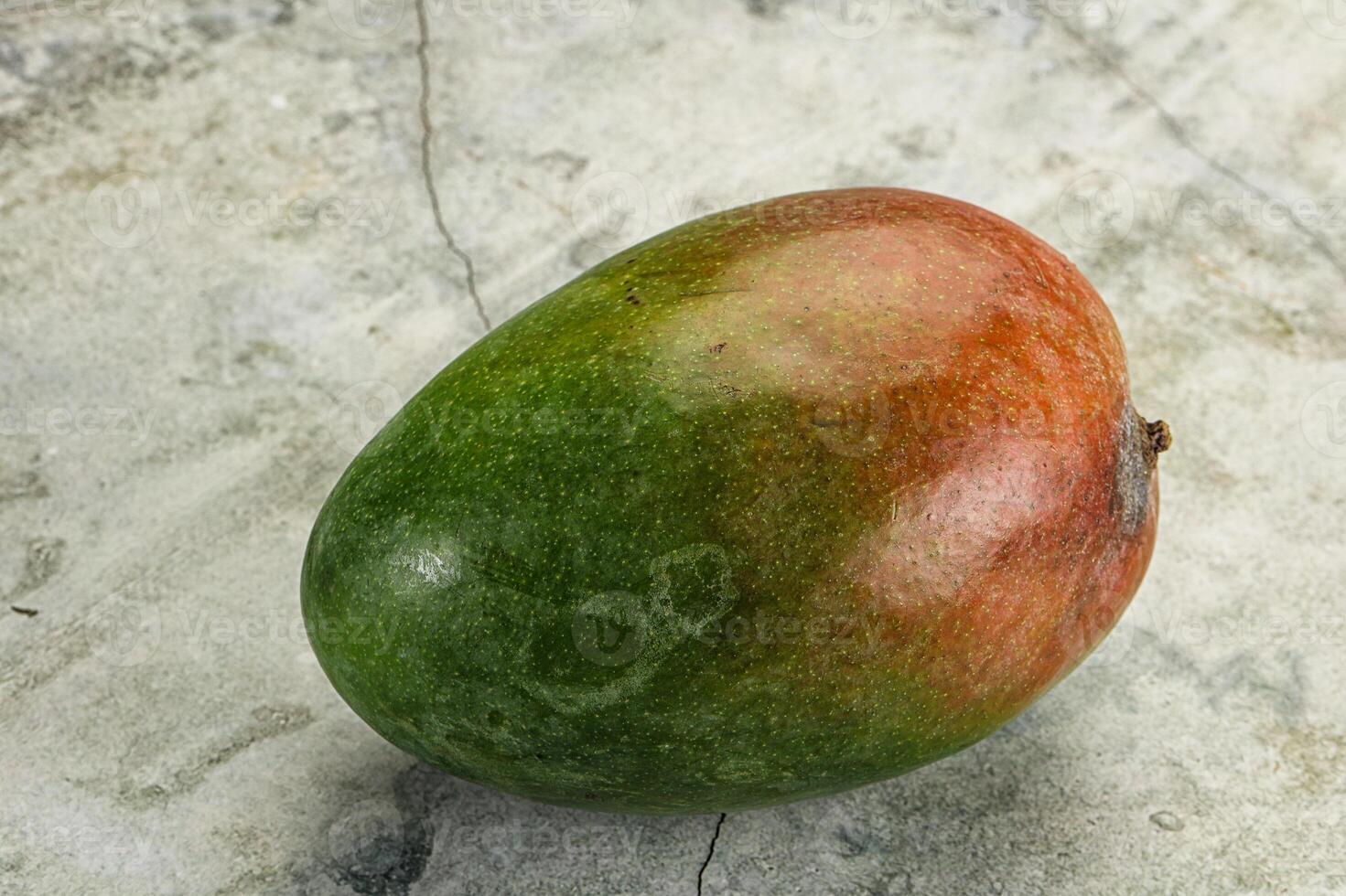 Sweet juicy green and red mango photo