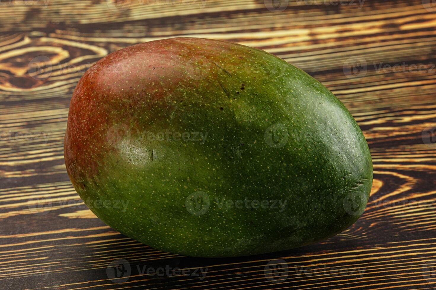 Sweet juicy green and red mango photo
