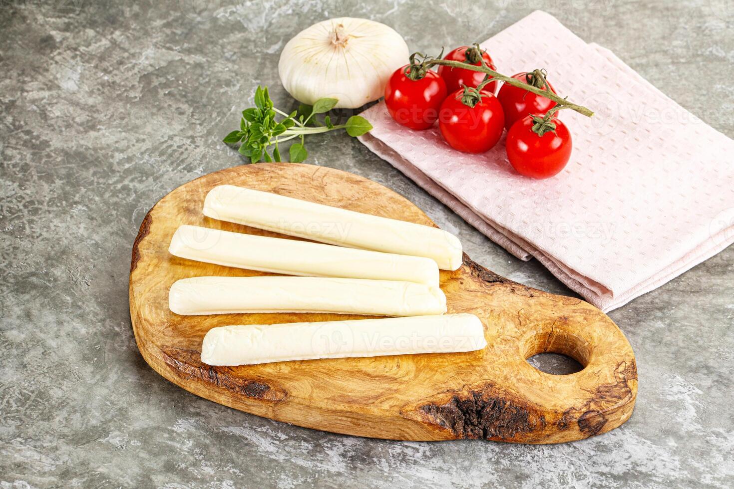 Mozzarella cheese stick heap snack photo