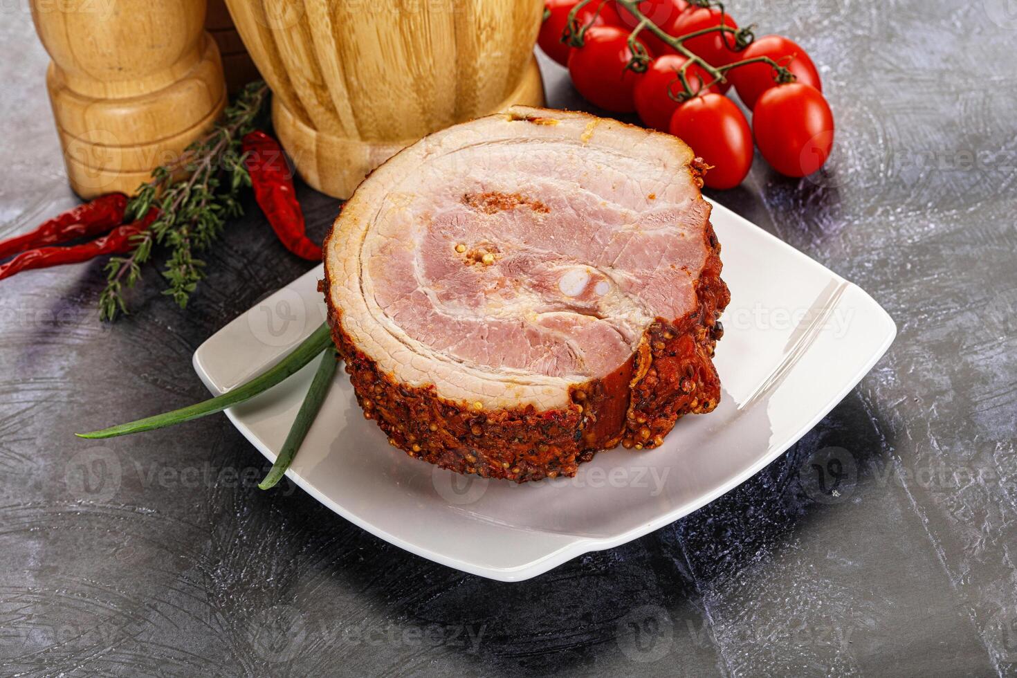 Tasty and fat smoked pork belly photo